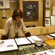 Linda Johnson Rice, president of Jet magazine, looking over awards won by the magazine in 2001.